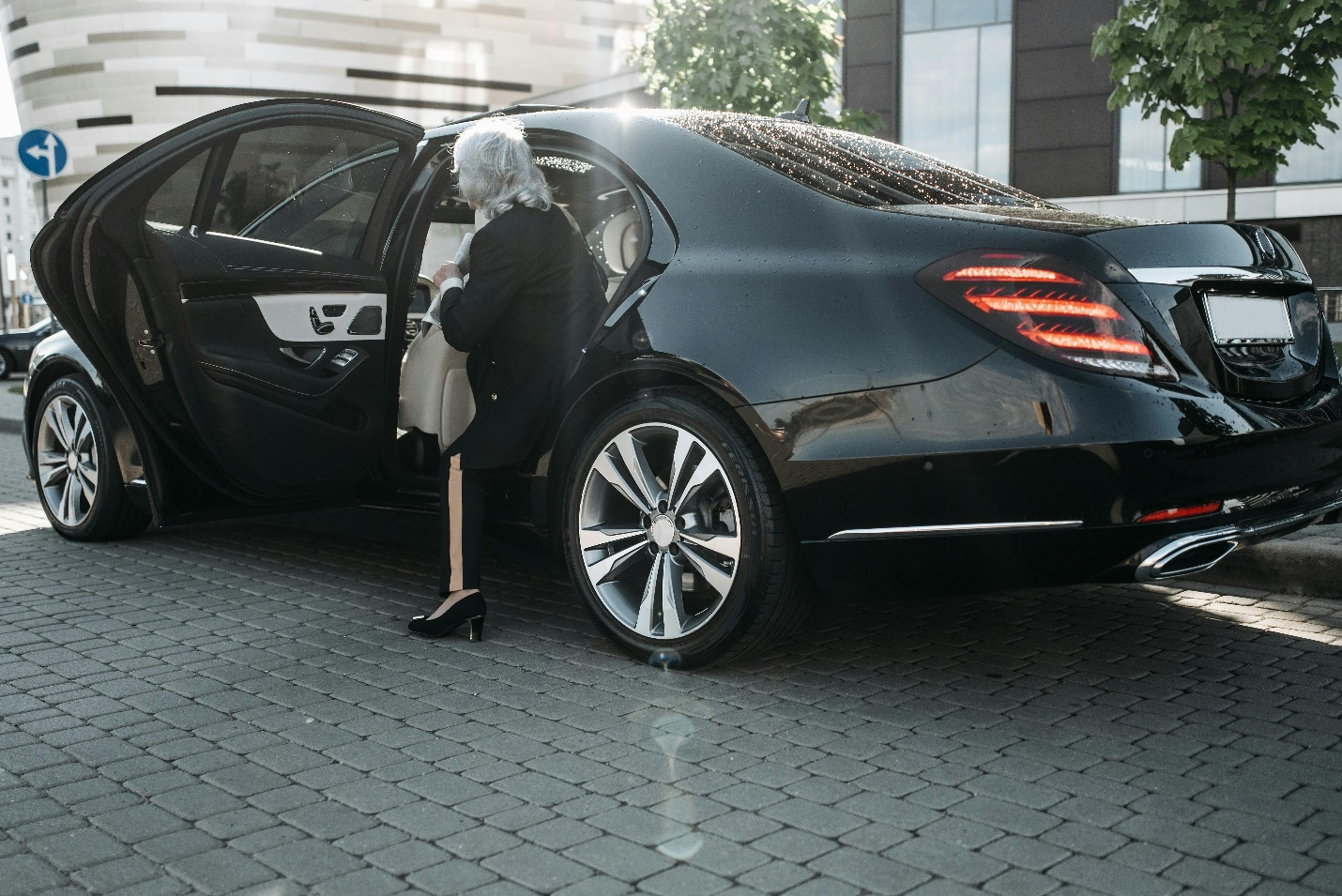 Woman Getting Inside a Car